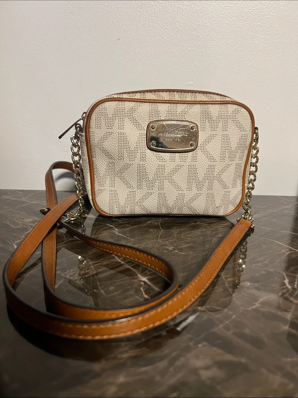 Michael Kors Jet Set Small Crossbody Bag in a vanilla and acorn color trim strap
